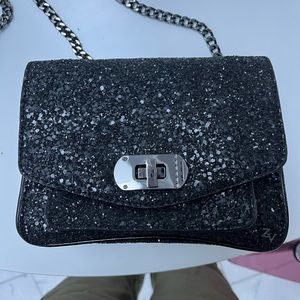 Zadig & Voltaire sparkly bag with black glitters.